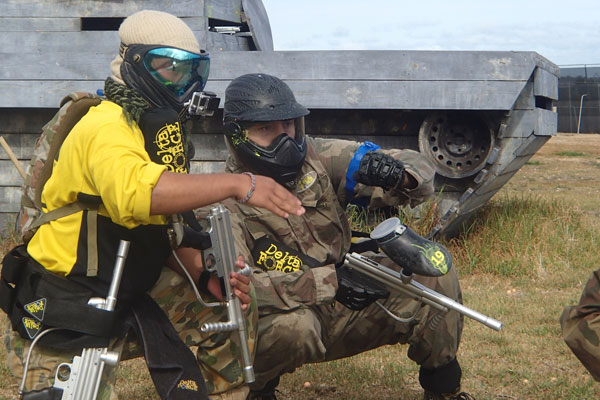 A team of Delta Force marshals wearing yellow uniforms